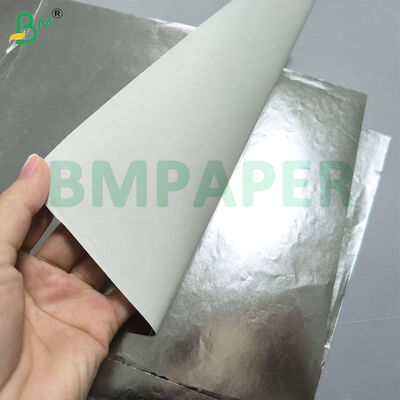 กระดาษเบื้องต้นตราขวดเบียร์ ด้านหนึ่งเงินและทอง ด้านหนึ่งขาว